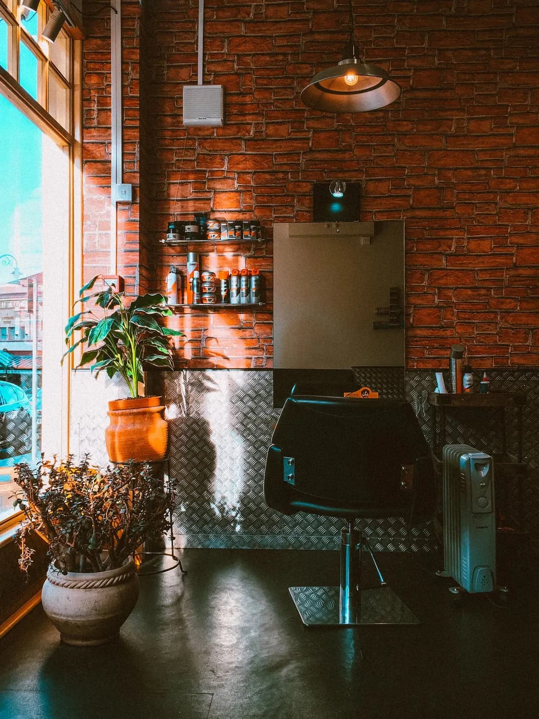 A calm salon front, softly lit
