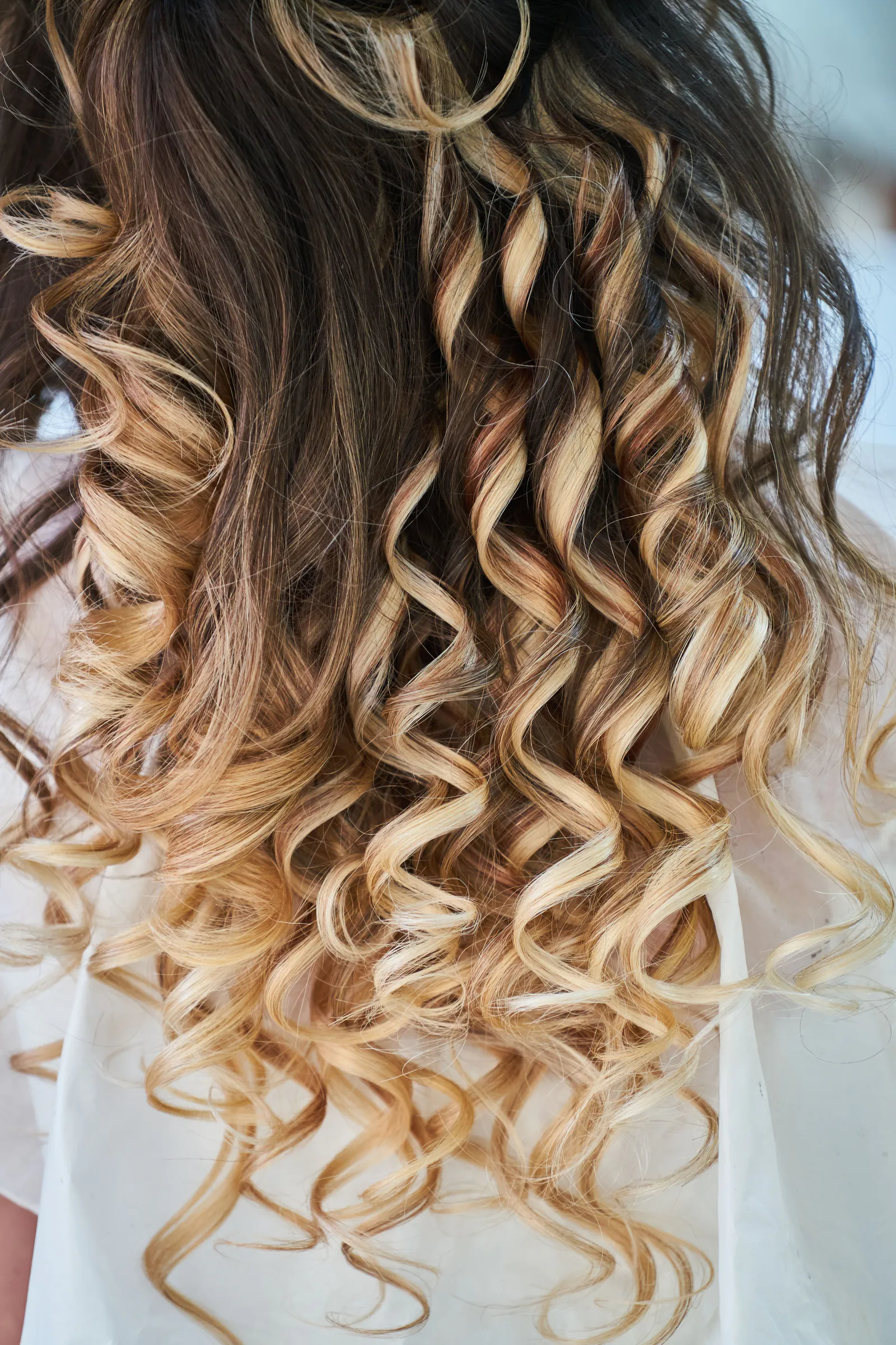Long golden curls, freshly set